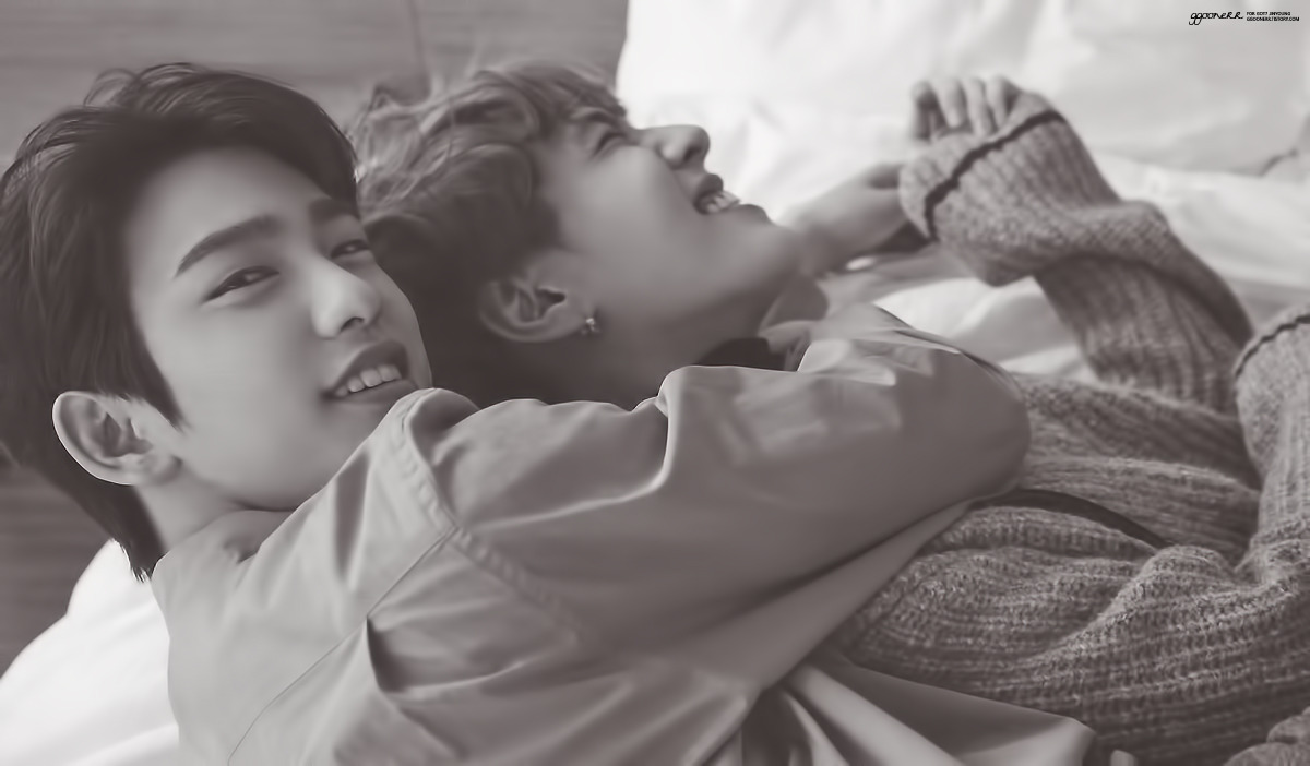 Pic of Yugyeom Lying Across Two Beds
