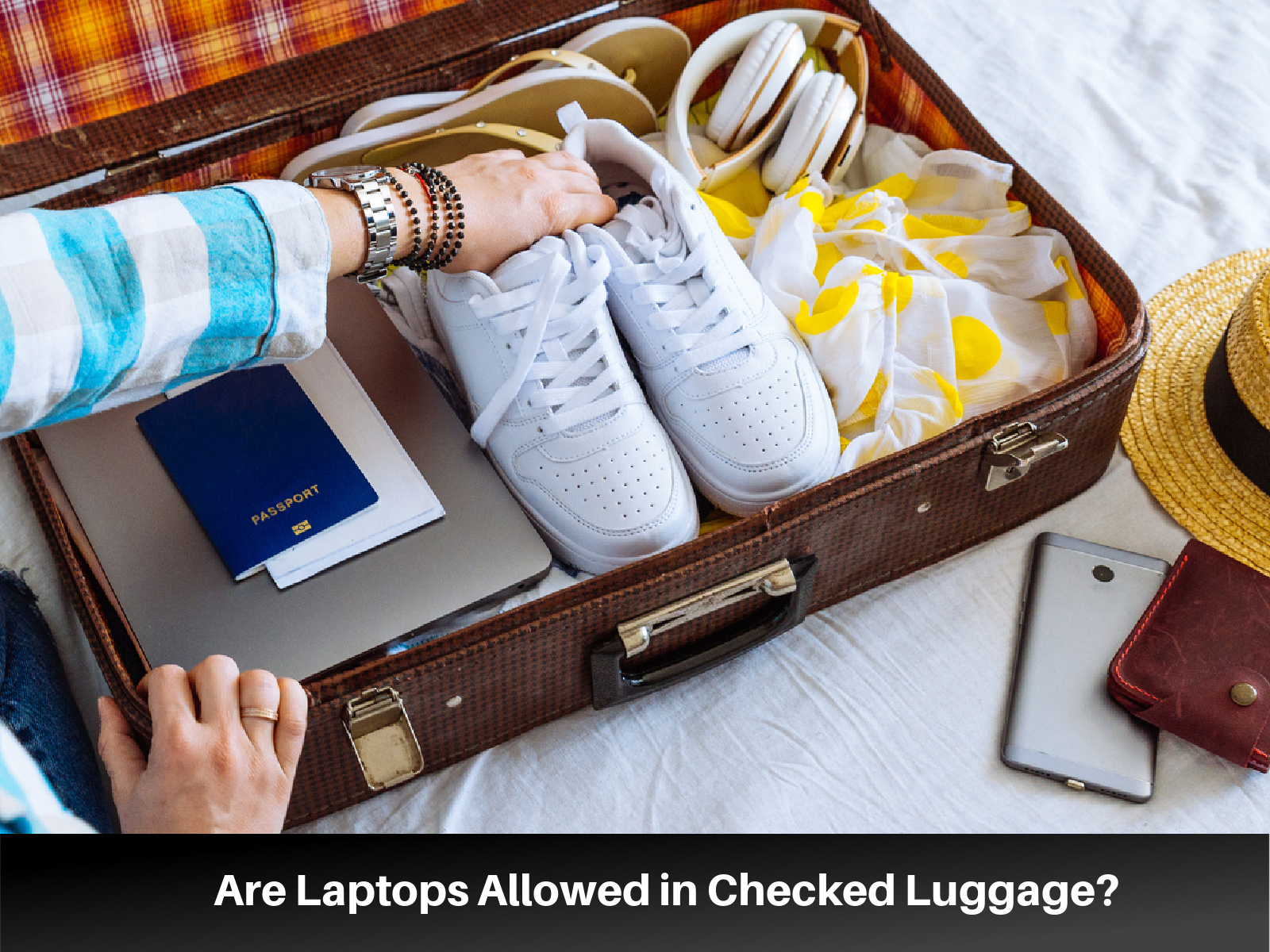Can I Pack Laptop in Checked Baggage