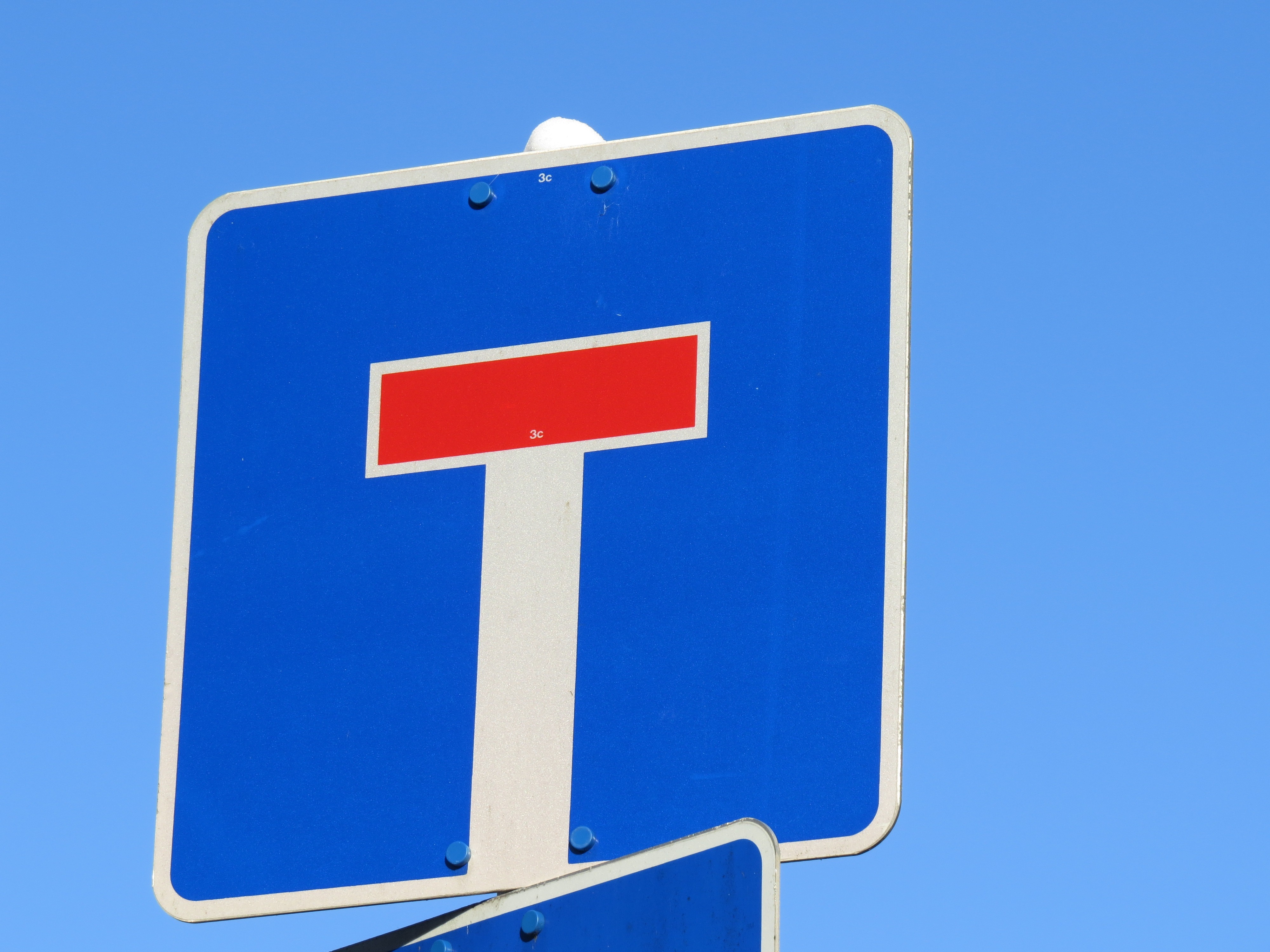 Blue Road Sign with Red Line